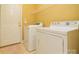 Laundry room with washer, dryer and shelving at 2534 Old Ashworth Nw Ln, Concord, NC 28027