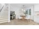 Bright dining area with a table and chairs, located near the kitchen and stairs at 2739 Goneaway Rd, Charlotte, NC 28210