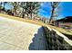 Spacious backyard with stamped concrete patio and retaining wall at 4513 Munsee St, Charlotte, NC 28213