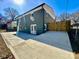 Newly renovated home with stamped concrete patio at 4513 Munsee St, Charlotte, NC 28213