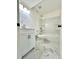 Bathroom with white vanity, tub, and marble floor at 4513 Munsee St, Charlotte, NC 28213