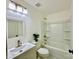 Bathroom with white vanity, bathtub and tiled floor at 4513 Munsee St, Charlotte, NC 28213