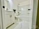 Clean bathroom with white vanity and marble-look flooring at 4513 Munsee St, Charlotte, NC 28213