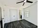 Bedroom with en-suite bathroom and double doors at 4513 Munsee St, Charlotte, NC 28213