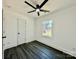 Well-lit bedroom with hardwood floors and window at 4513 Munsee St, Charlotte, NC 28213
