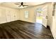 Bright bedroom with hardwood floors and access to backyard at 4513 Munsee St, Charlotte, NC 28213