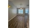 Living room with vinyl plank flooring, and ceiling fan at 484 Lexie Ln, Rock Hill, SC 29732