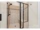 Modern bathroom with a large walk-in shower at 4998 Looking Glass Trl, Denver, NC 28037