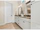 Spa-like bathroom with double sinks and ample storage at 4998 Looking Glass Trl, Denver, NC 28037