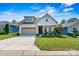 Craftsman style home with front porch and landscaped yard at 4998 Looking Glass Trl, Denver, NC 28037