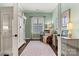 Charming home office with built-in shelving and a comfortable chair at 4998 Looking Glass Trl, Denver, NC 28037