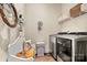 Well-appointed laundry room with washer, dryer and storage at 4998 Looking Glass Trl, Denver, NC 28037