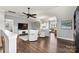 Cozy upstairs bonus room featuring hardwood floors, high ceilings, and ample space for entertaining at 4998 Looking Glass Trl, Denver, NC 28037