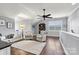 Open bonus room with hardwood floors and high ceilings at 4998 Looking Glass Trl, Denver, NC 28037