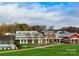 Community clubhouse with pool and outdoor spaces at 4998 Looking Glass Trl, Denver, NC 28037