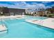 Community pool with multiple areas and fire pit at 4998 Looking Glass Trl, Denver, NC 28037