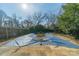 View of the backyard, featuring a covered pool and a gazebo at 531 Elm St, Salisbury, NC 28144