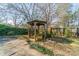 The backyard features a gazebo, wooden fence and some shrubbery at 531 Elm St, Salisbury, NC 28144