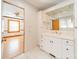 Bathroom featuring a spacious vanity and a view into the bedroom creating an open and airy feel at 531 Elm St, Salisbury, NC 28144