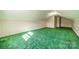 Spacious, finished attic space with green carpeting and decorative wallpaper at 531 Elm St, Salisbury, NC 28144