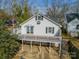 Exterior of a home with a deck and spiral staircase, offering backyard access at 531 Elm St, Salisbury, NC 28144
