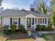 Charming home with a well-manicured lawn and lovely landscaping, creating inviting curb appeal at 531 Elm St, Salisbury, NC 28144