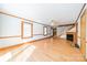 Bright living room features hardwood floors, fireplace, and wood trim creating a warm and inviting space at 531 Elm St, Salisbury, NC 28144