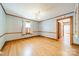 Room featuring hardwood floors, classic trim and ample natural light through a window at 531 Elm St, Salisbury, NC 28144