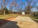 Large backyard with a storage shed and open space at 614 N Mountain St, Cherryville, NC 28021