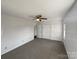 Spacious bedroom with double closets and ceiling fan at 614 N Mountain St, Cherryville, NC 28021