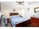 Cozy bedroom with a wooden sleigh bed, nightstands, and window at 630 Montgomery Dr, Rock Hill, SC 29732