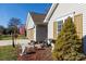 Tan house with attached garage and American flag at 630 Montgomery Dr, Rock Hill, SC 29732
