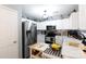 Modern kitchen with stainless steel appliances and white cabinetry at 630 Montgomery Dr, Rock Hill, SC 29732