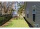 Side yard with white fence and gate at 630 Montgomery Dr, Rock Hill, SC 29732