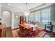 Inviting dining room featuring a stylish chandelier and classic wooden furniture at 109 Belfry Loop, Mooresville, NC 28117