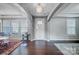 Bright foyer with hardwood floors, neutral paint, and a stylish light fixture at 109 Belfry Loop, Mooresville, NC 28117