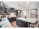 Elegant kitchen featuring granite countertops, stainless steel appliances, and ample cabinet space at 109 Belfry Loop, Mooresville, NC 28117