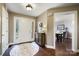 Bright entryway with hardwood floors and view to dining area at 109 Rob Ln, Mooresville, NC 28117