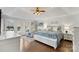 Large main bedroom with sitting area and backyard view at 109 Rob Ln, Mooresville, NC 28117