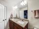 Bathroom featuring double sink vanity with granite countertops and modern fixtures at 1108 Township Pkwy, Belmont, NC 28012