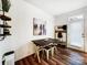 Cozy dining area featuring wood floors and a unique wall decor at 1108 Township Pkwy, Belmont, NC 28012