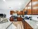 Spacious kitchen with stainless appliances, granite counters, and wood cabinetry at 1108 Township Pkwy, Belmont, NC 28012