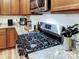 Gas range in a kitchen featuring granite countertops and stainless steel appliances at 1108 Township Pkwy, Belmont, NC 28012