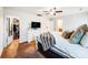 Bright main bedroom featuring a walk-in closet, soft carpet and an ensuite bath at 1108 Township Pkwy, Belmont, NC 28012