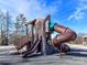 Unique treehouse-themed playground structure with slides and climbing features at 114 Marron Dr, Indian Trail, NC 28079