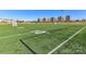 Lush green sports field with well-marked lines and athletic complex in background at 114 Marron Dr, Indian Trail, NC 28079