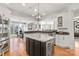 Spacious kitchen with stainless steel appliances, wine fridge and hardwood floors at 115 Union Chapel Dr, Mooresville, NC 28117