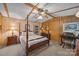 Spacious bedroom with a comfortable post bed and work area at 11745 Stokes Ferry Rd, Gold Hill, NC 28071