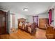 Bedroom with hardwood floors and antique furniture at 11745 Stokes Ferry Rd, Gold Hill, NC 28071