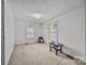 Simple bedroom with two windows and neutral decor at 11745 Stokes Ferry Rd, Gold Hill, NC 28071